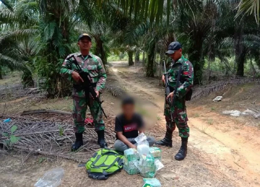 Foto: Satgas Pamtas Yonif 645/Gty Berhasil Gagalkan Penyelundupan Sabu 13,6 Kg di Perbatasan  | Pifa Net