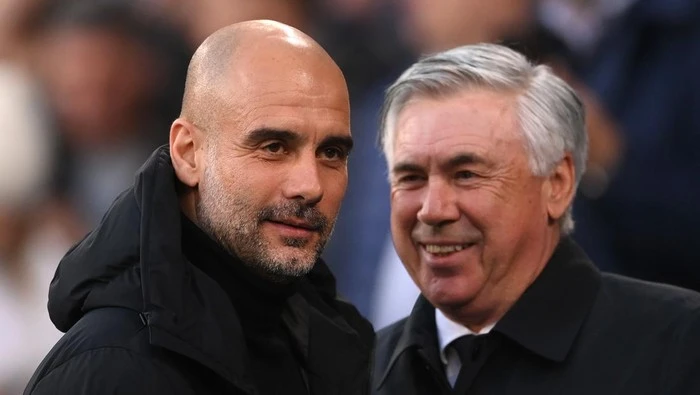 Carlo Ancelotti dan Pep Guardiola optimis menatap laga semifinal UCL. (Getty Images/Laurence Griffiths)